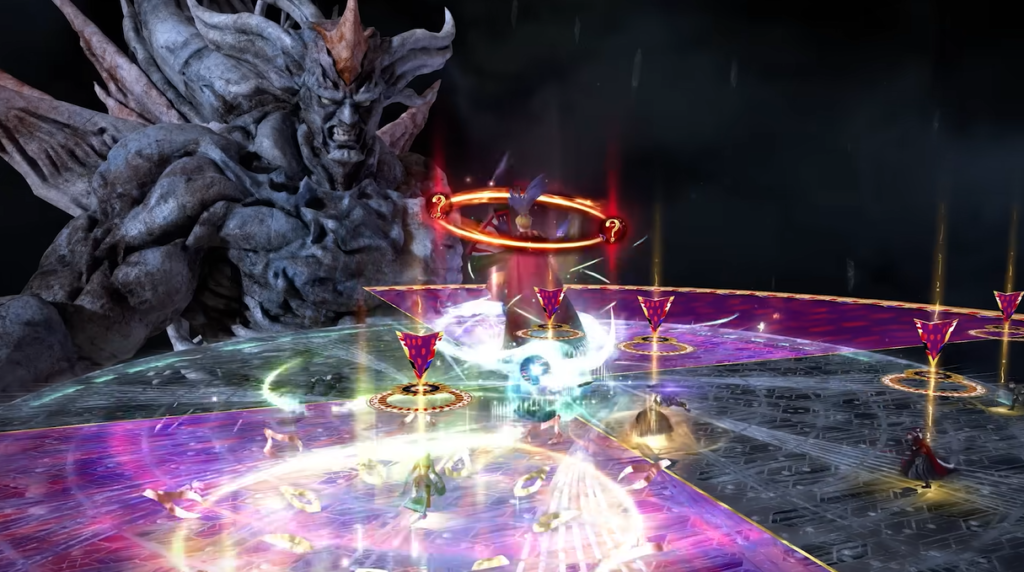 Screengrab from the trailer for Dancing Mad (Ultimate) showing a mechanic involving two cleaves projected on the floor and markers over the players heads. Kefka has a couple of red orbs with question marks circling his head, and purple blank orbs circling his feet. The bottom piece of the statue stands in the background.